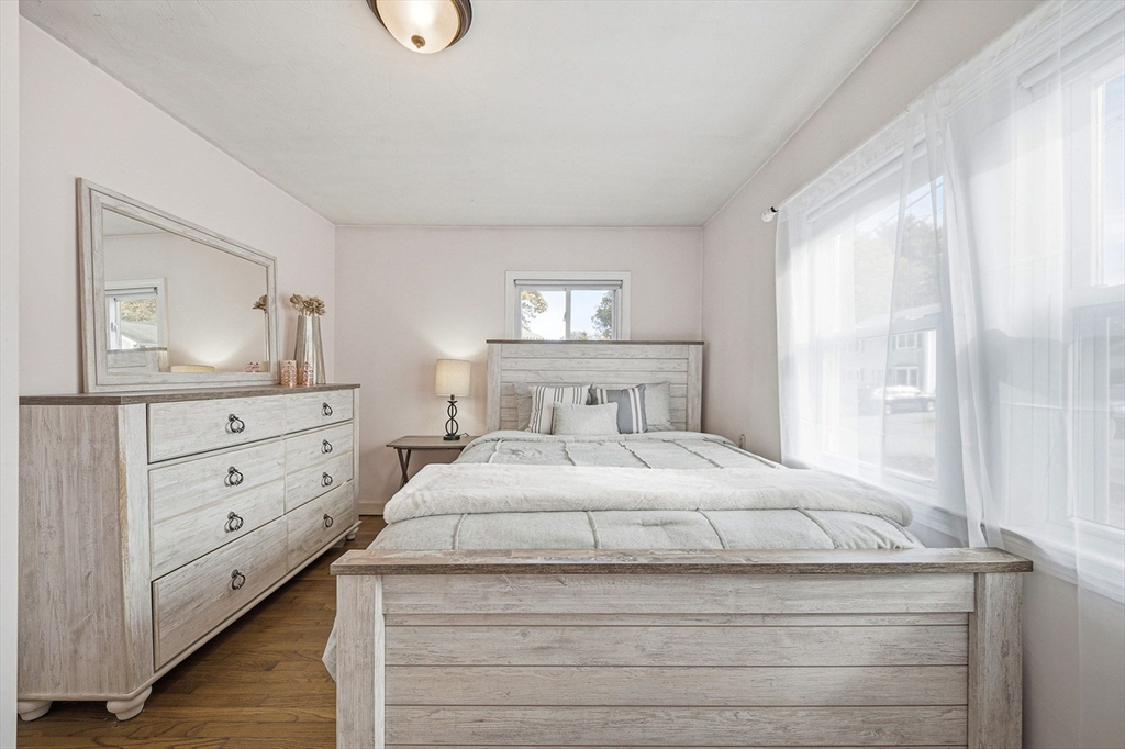 63 Juniper Road Holbrook, MA 02343 - Photo 23 of 35 a bedroom with a bed and a dresser