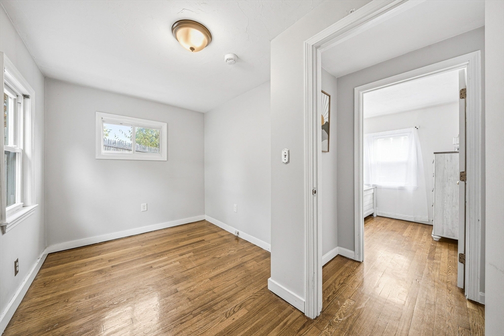 63 Juniper Road Holbrook, MA 02343 - Photo 24 of 35 a view of room with wooden floor and window