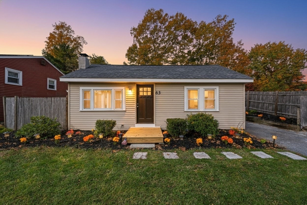 63 Juniper Road Holbrook, MA 02343 - Photo 35 of 35 a backyard of a house with table and chairs