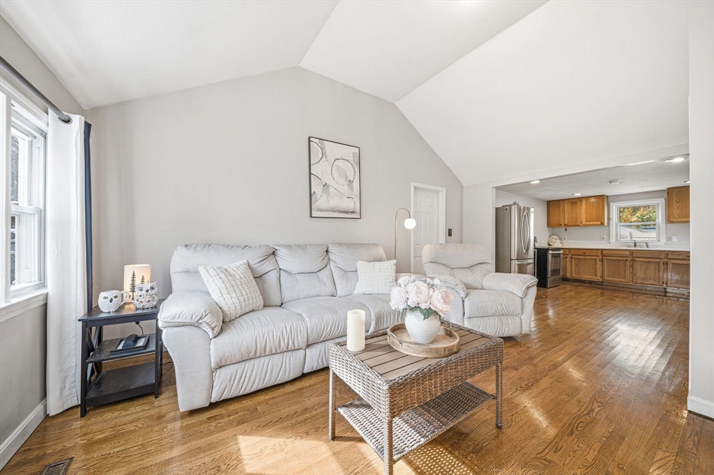 63 Juniper Road Holbrook, MA 02343 - Photo 4 of 35 a living room with furniture and a wooden floor