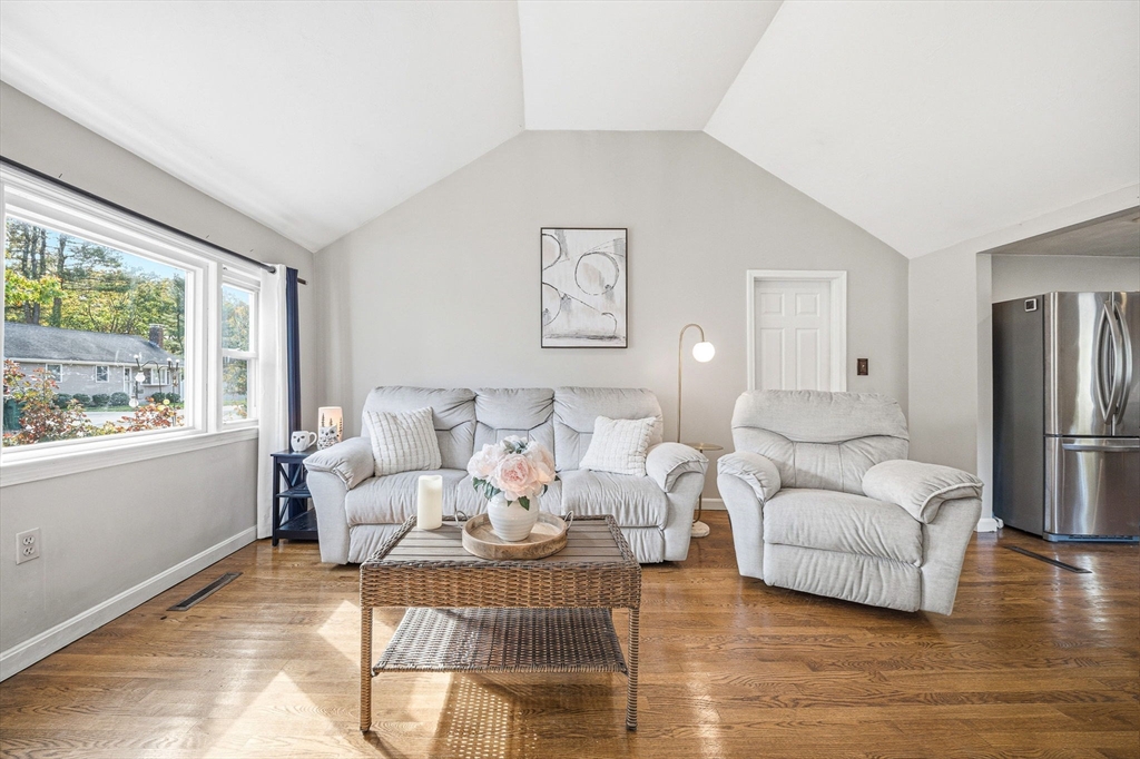 63 Juniper Road Holbrook, MA 02343 - Photo 5 of 35 a living room with furniture and a large window