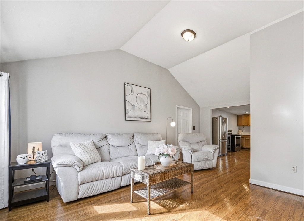 63 Juniper Road Holbrook, MA 02343 - Photo 8 of 35 a living room with furniture and wooden floor