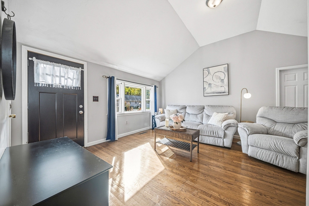63 Juniper Road Holbrook, MA 02343 - Photo 9 of 35 a living room with furniture and a window