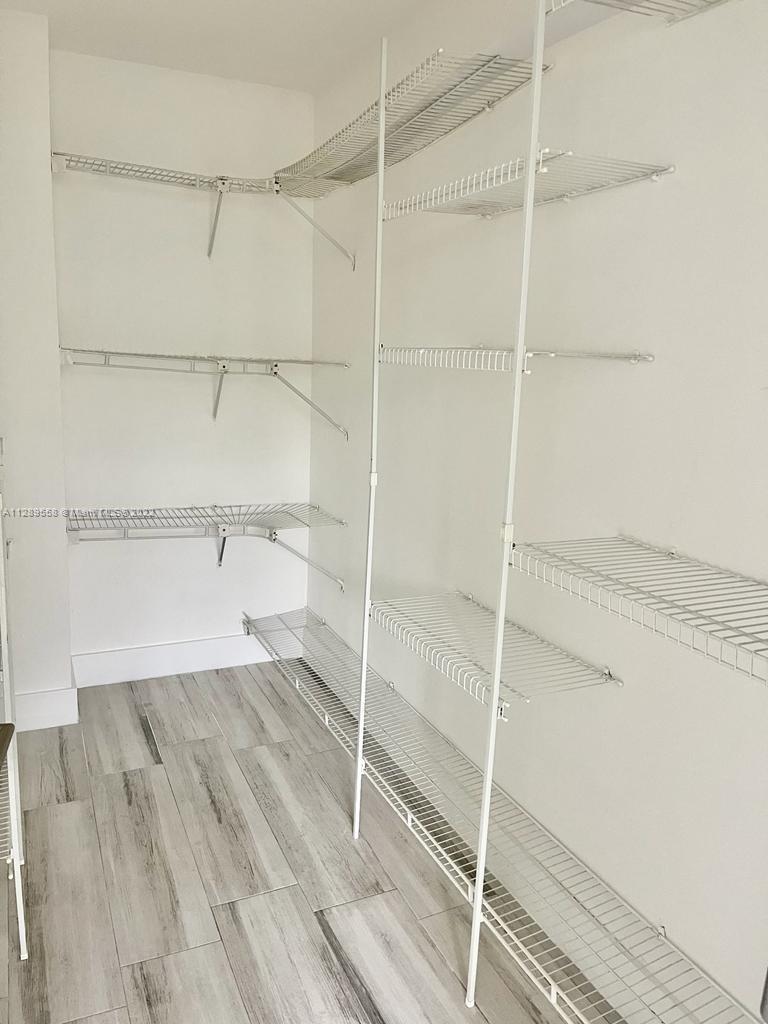 8050 Northwest 8th Street, Unit 201 Miami, FL 33126 - Photo 12 of 13 a bathroom with a shower