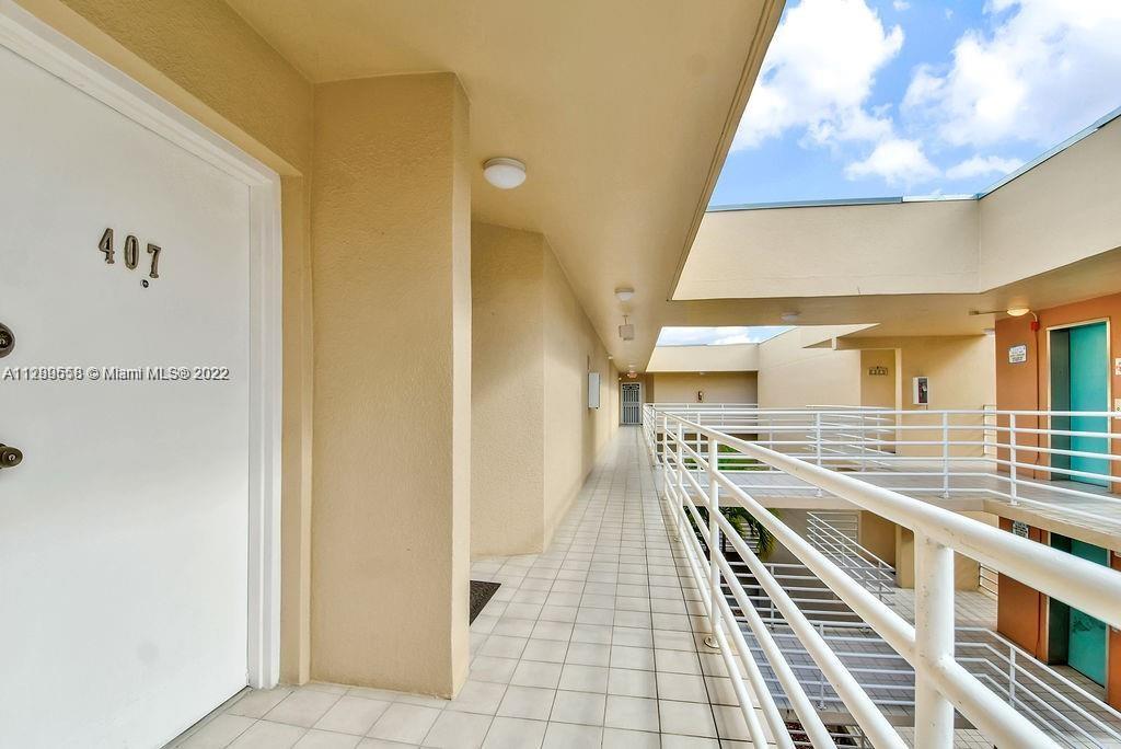 8050 Northwest 8th Street, Unit 201 Miami, FL 33126 - Photo 4 of 13 a very nice looking room with a large window