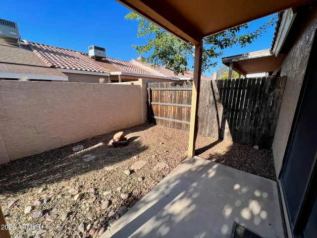 a view of a backyard with a tv