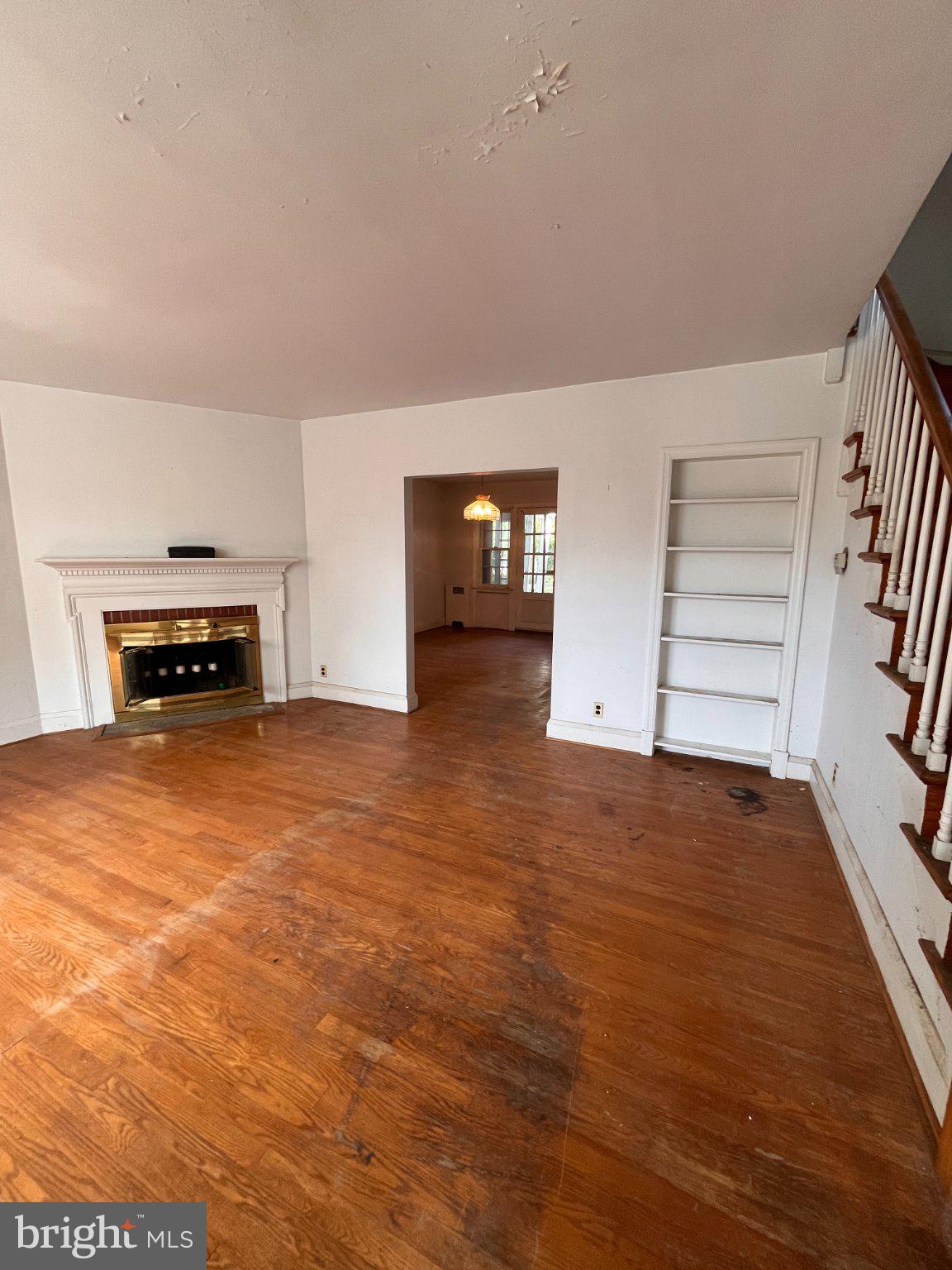 5906 Ayleshire Road Baltimore, MD 21239 - Photo 4 of 41 Spacious living area with natural hardwood floors.