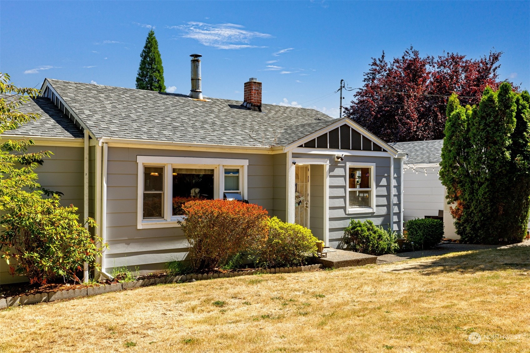 2275 Douglas Road Ferndale, WA 98248 - Photo 1 of 34 a front view of a house with a yard