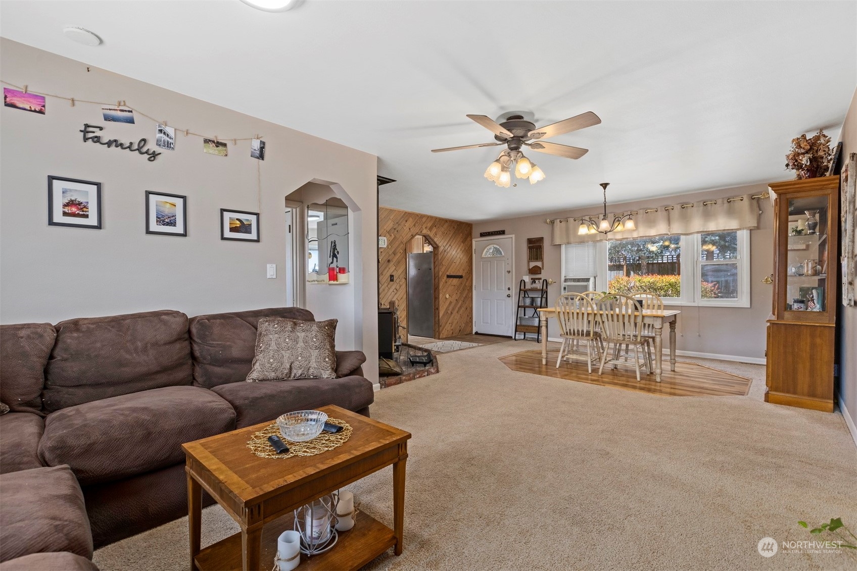 2275 Douglas Road Ferndale, WA 98248 - Photo 13 of 34 a living room with furniture and a dining table with kitchen view