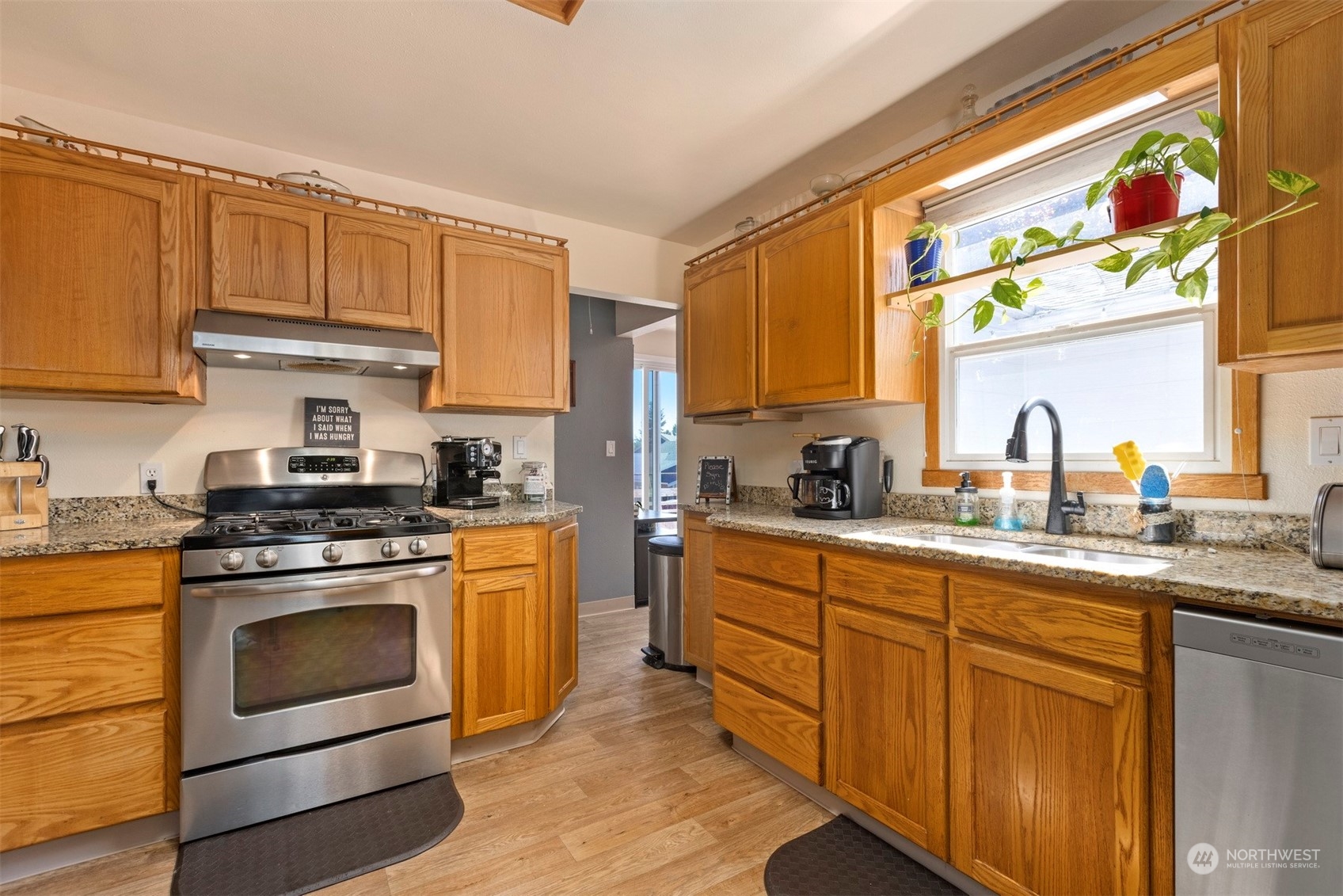 2275 Douglas Road Ferndale, WA 98248 - Photo 15 of 34 a kitchen with stainless steel appliances granite countertop a stove sink and cabinets