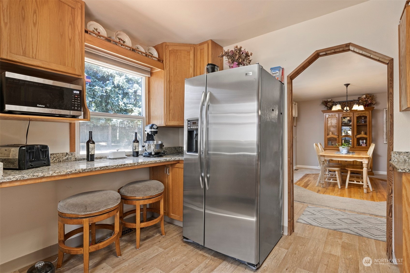 2275 Douglas Road Ferndale, WA 98248 - Photo 16 of 34 a kitchen with stainless steel appliances granite countertop a refrigerator and a stove top oven