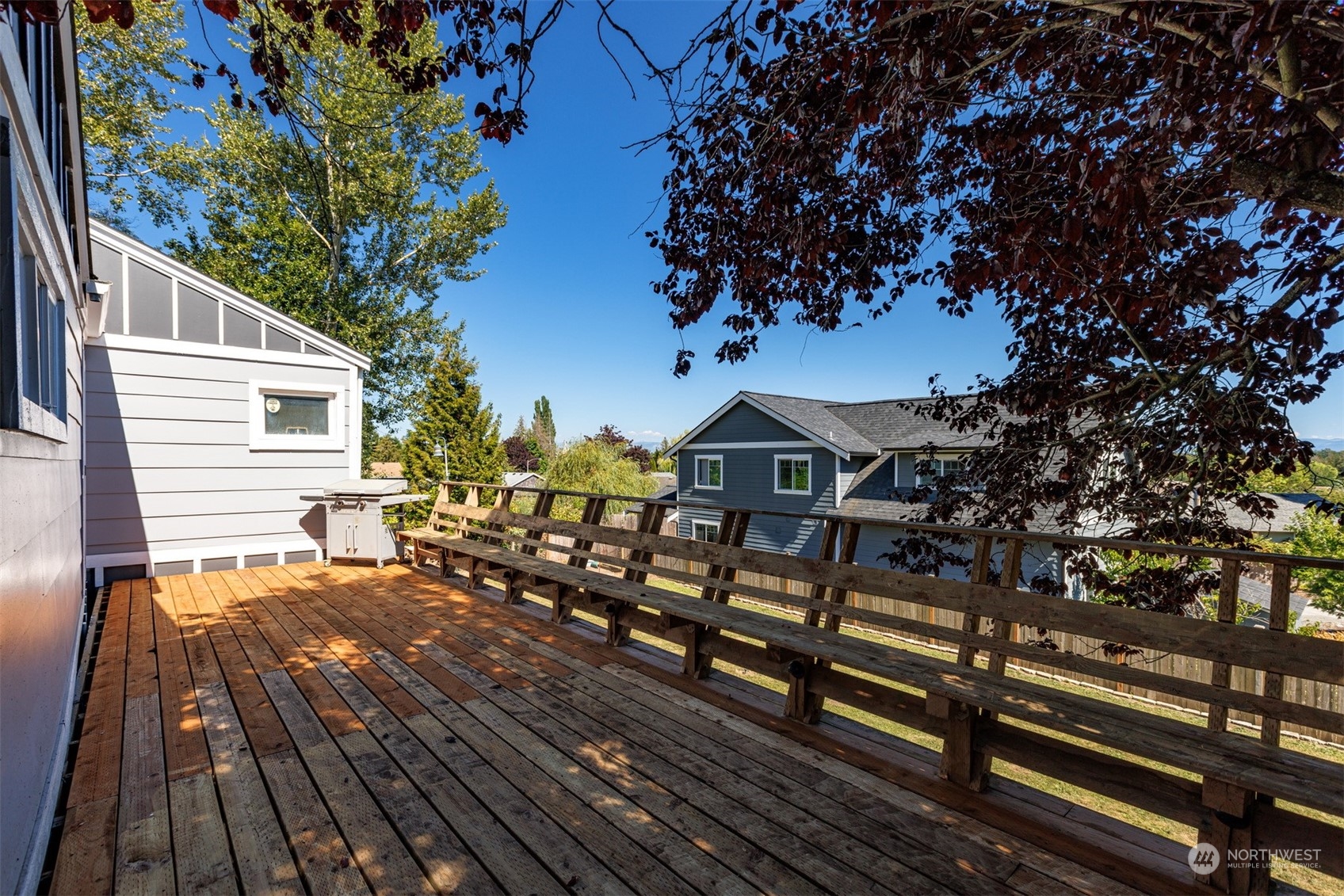 2275 Douglas Road Ferndale, WA 98248 - Photo 32 of 34 a view of a wooden chairs on the roof deck
