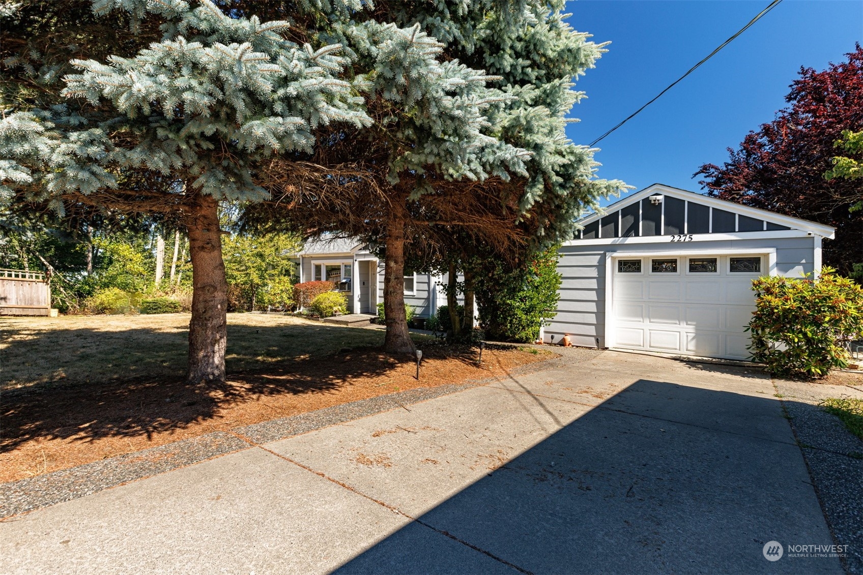 2275 Douglas Road Ferndale, WA 98248 - Photo 4 of 34 a front view of a house with a yard