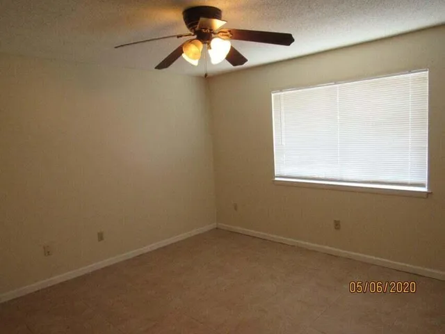 an empty room with a bathroom