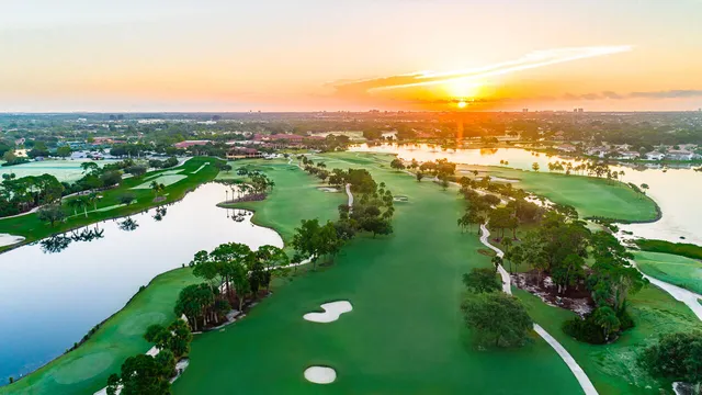 an aerial view of lake residential houses with outdoor space and swimming pool