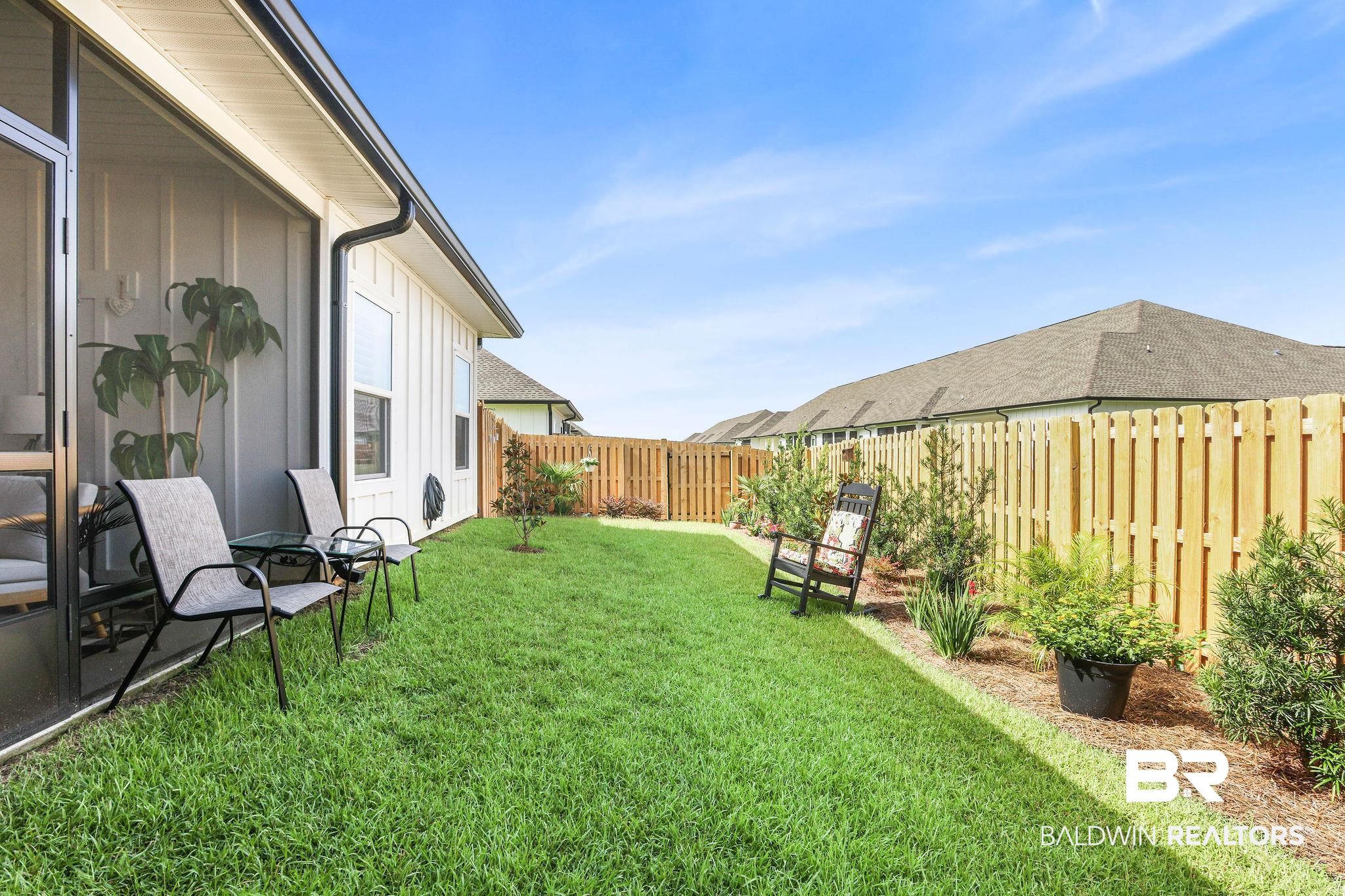 9901 Weller Cove Foley, AL 36535 - Photo 4 of 23 View of fenced backyard