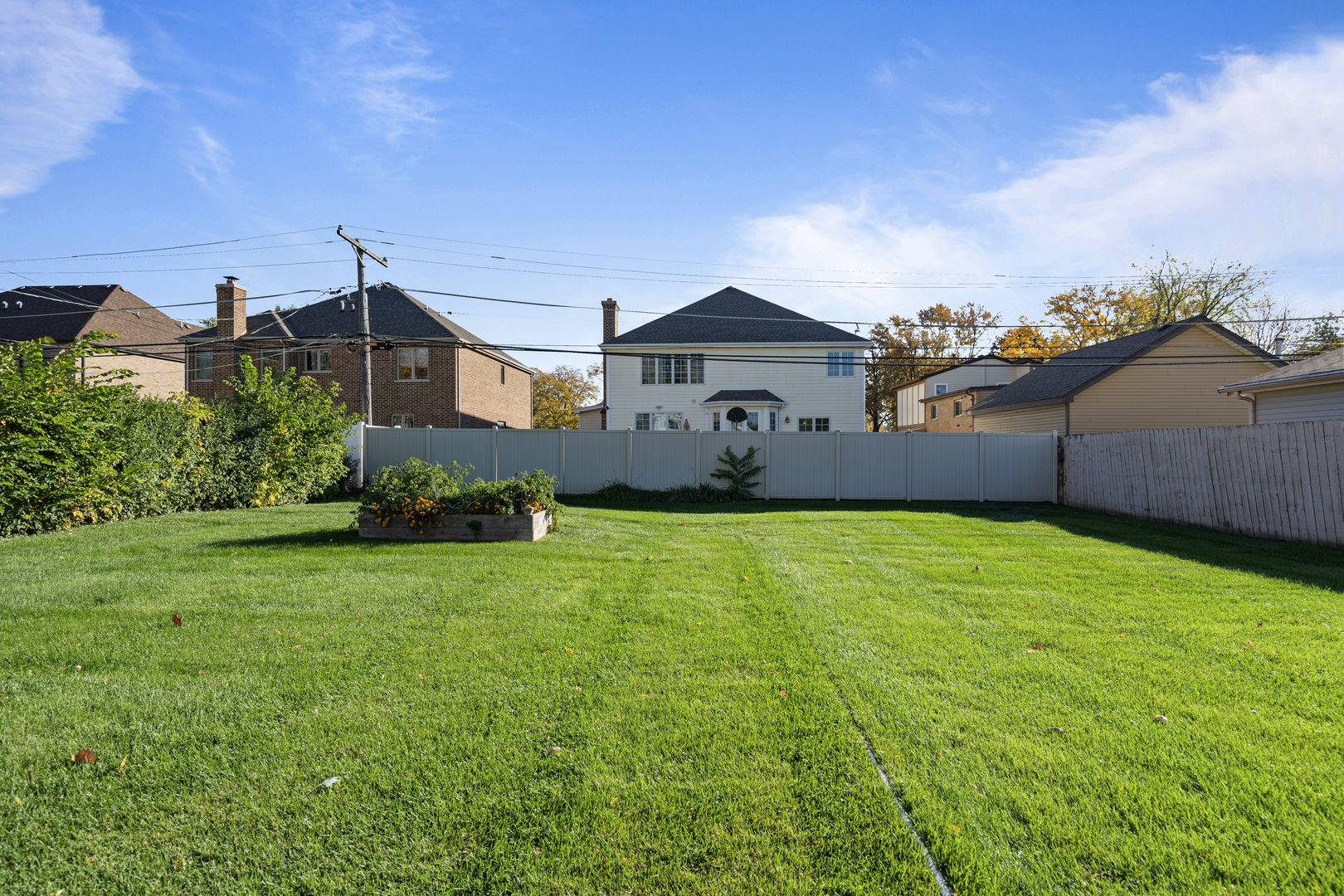 481 North Willow Road Elmhurst, IL 60126 - Photo 2 of 21 a front view of a house with a yard