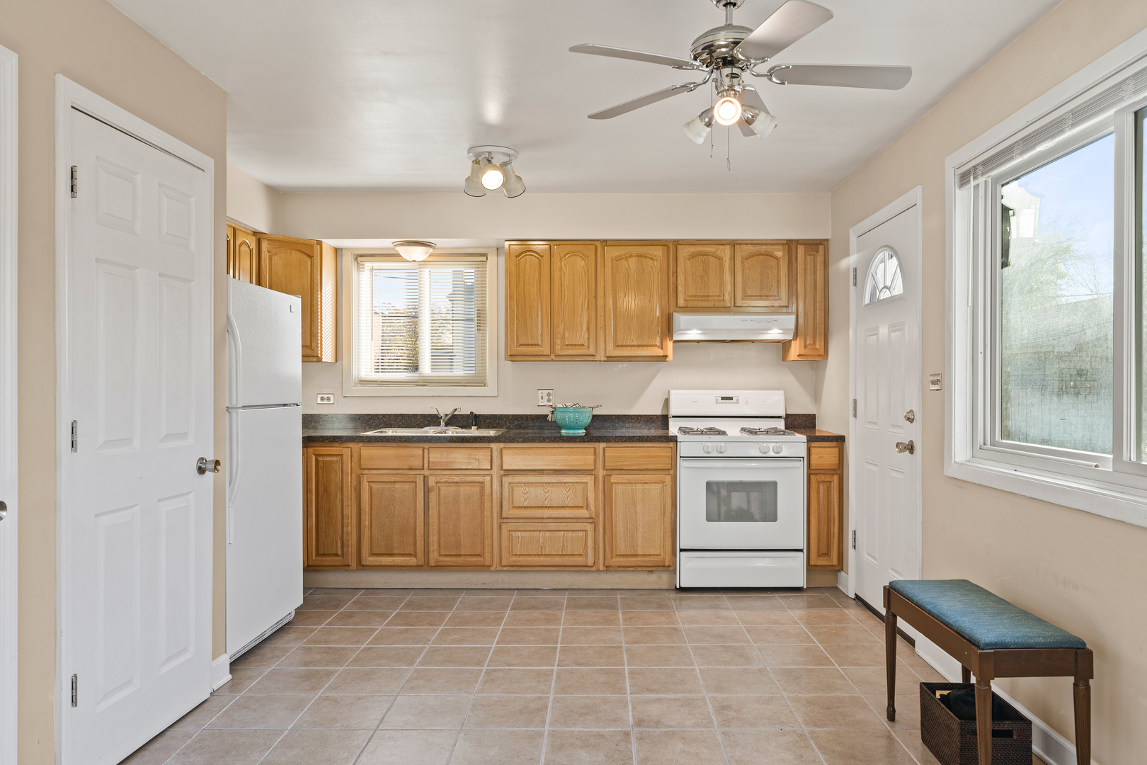 481 North Willow Road Elmhurst, IL 60126 - Photo 6 of 21 a kitchen with stainless steel appliances granite countertop a stove a sink and a refrigerator