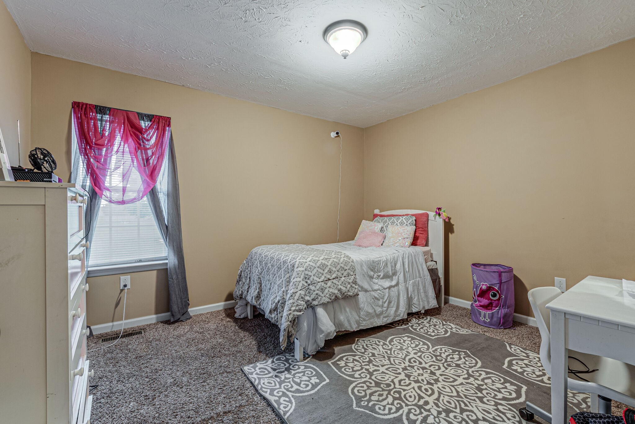 5 Roberts Lane Lebanon, TN 37087 - Photo 16 of 23 a bedroom with a bed and cabinets