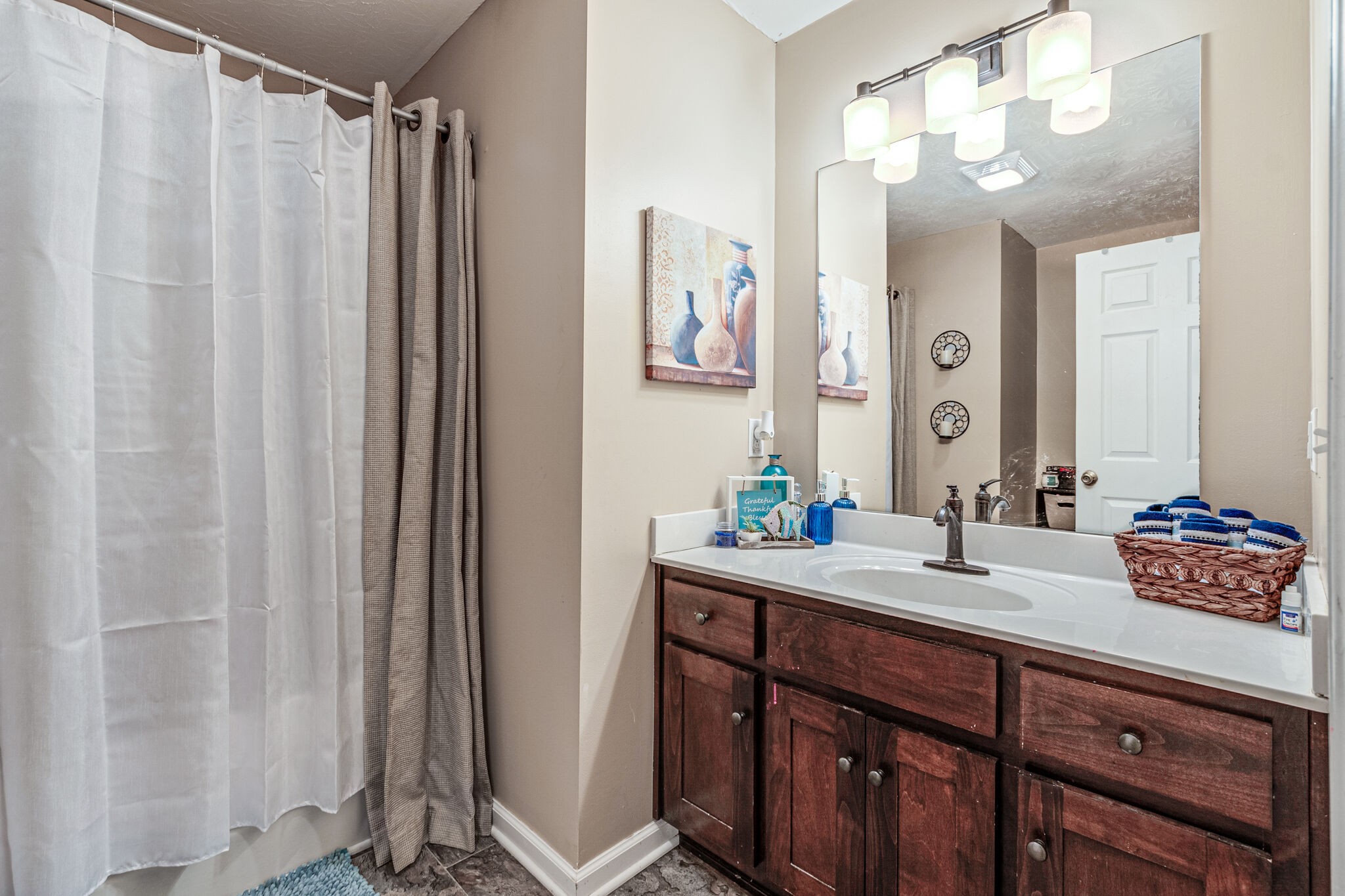 5 Roberts Lane Lebanon, TN 37087 - Photo 18 of 23 a bathroom with a double vanity sink and a mirror