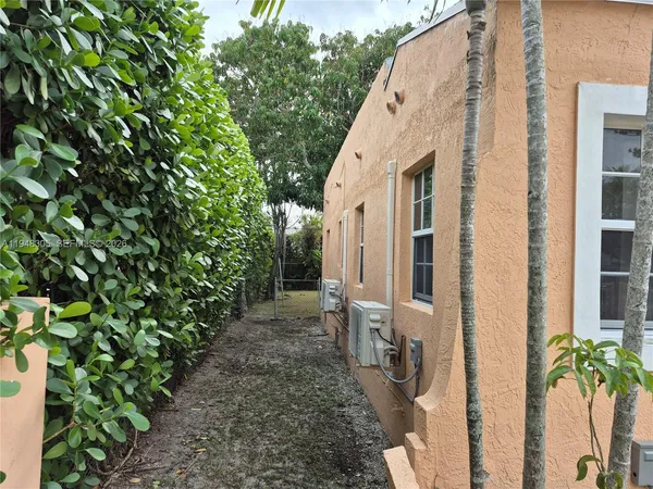 a view of a back yard of the house