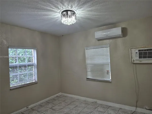 a view of a livingroom with a large window