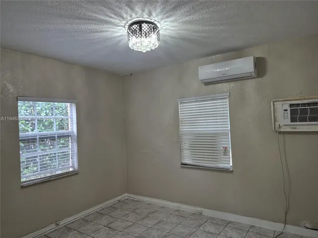 a view of a livingroom with a large window