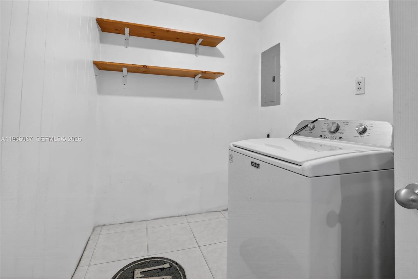 4998 Southwest 92nd Terrace Cooper City, FL 33328 - Photo 11 of 47 a utility room with dryer and washer