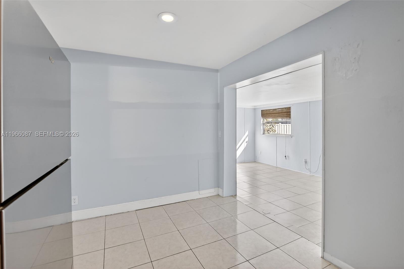 4998 Southwest 92nd Terrace Cooper City, FL 33328 - Photo 12 of 47 an empty room with windows