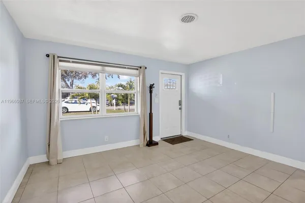 a view of an empty room with window