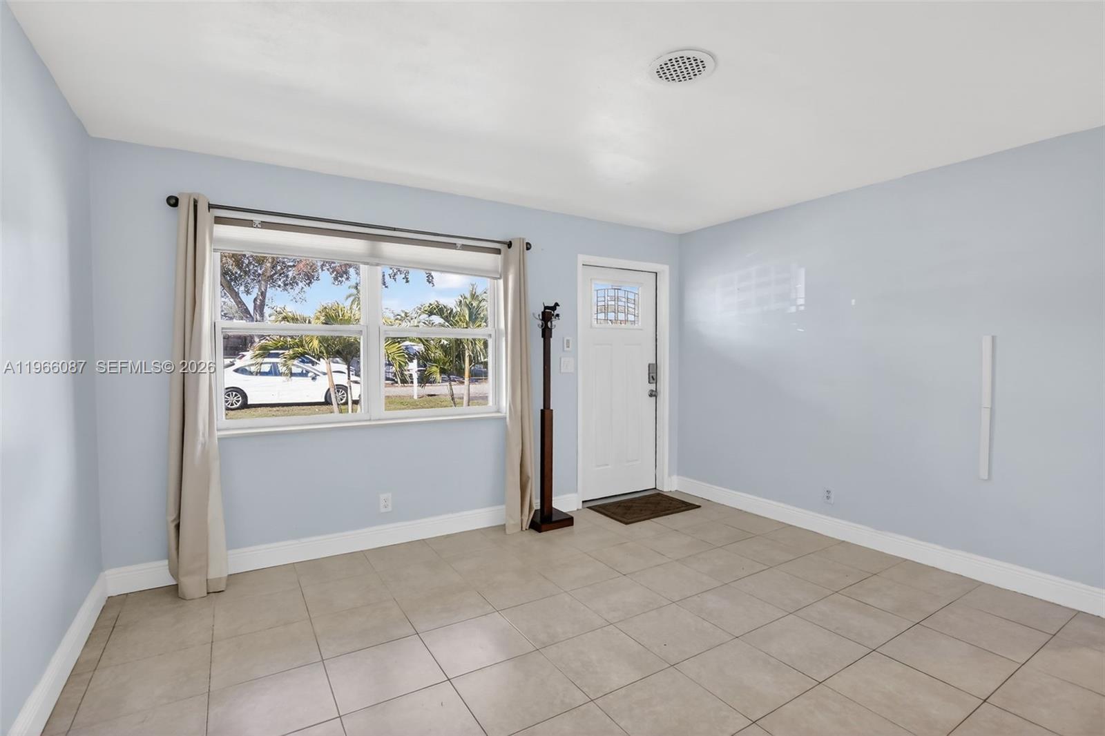 4998 Southwest 92nd Terrace Cooper City, FL 33328 - Photo 2 of 47 a view of an empty room with window