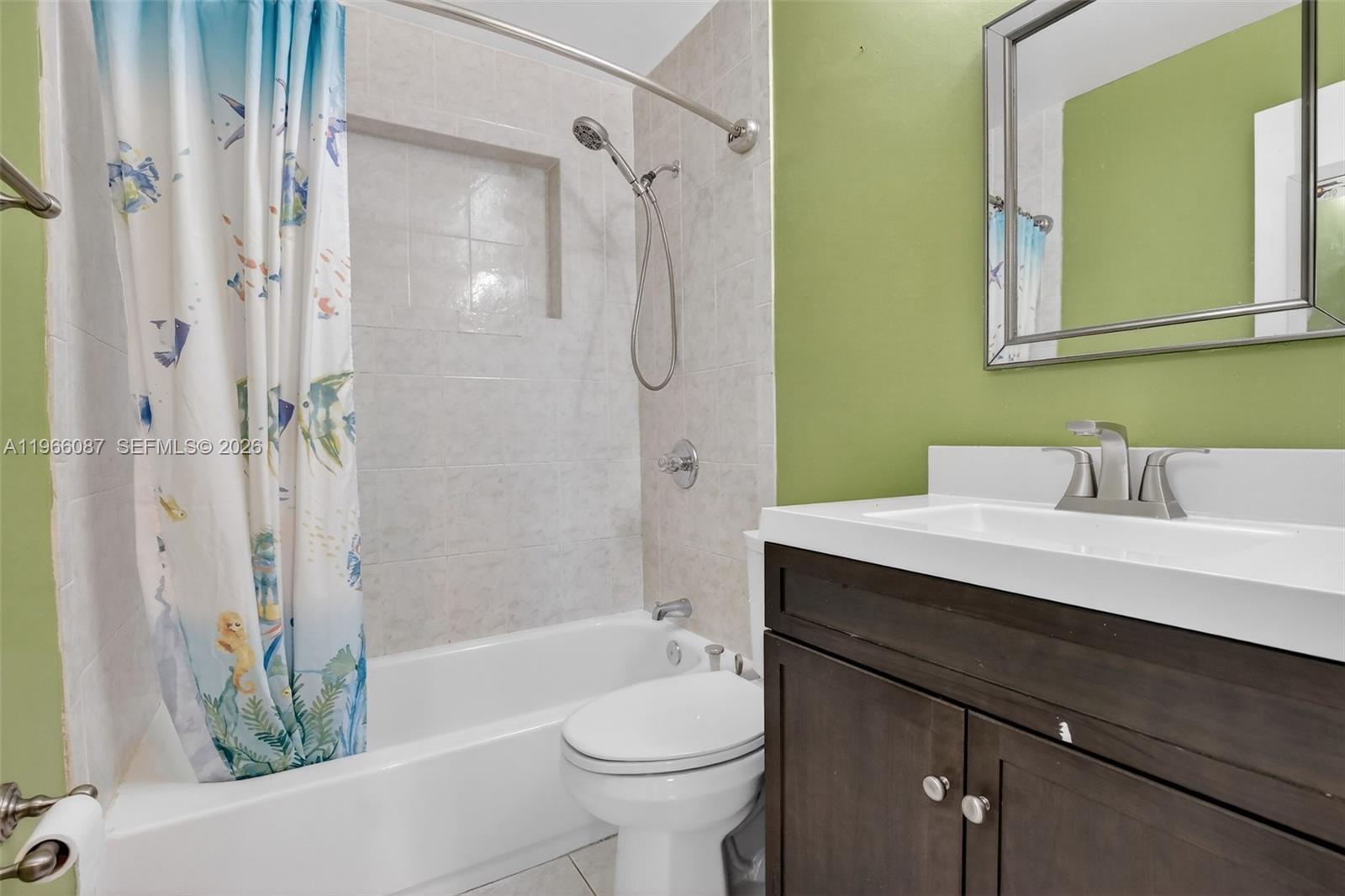 4998 Southwest 92nd Terrace Cooper City, FL 33328 - Photo 26 of 47 a bathroom with a sink a toilet and shower