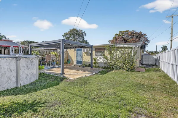 a view of a backyard with a slide