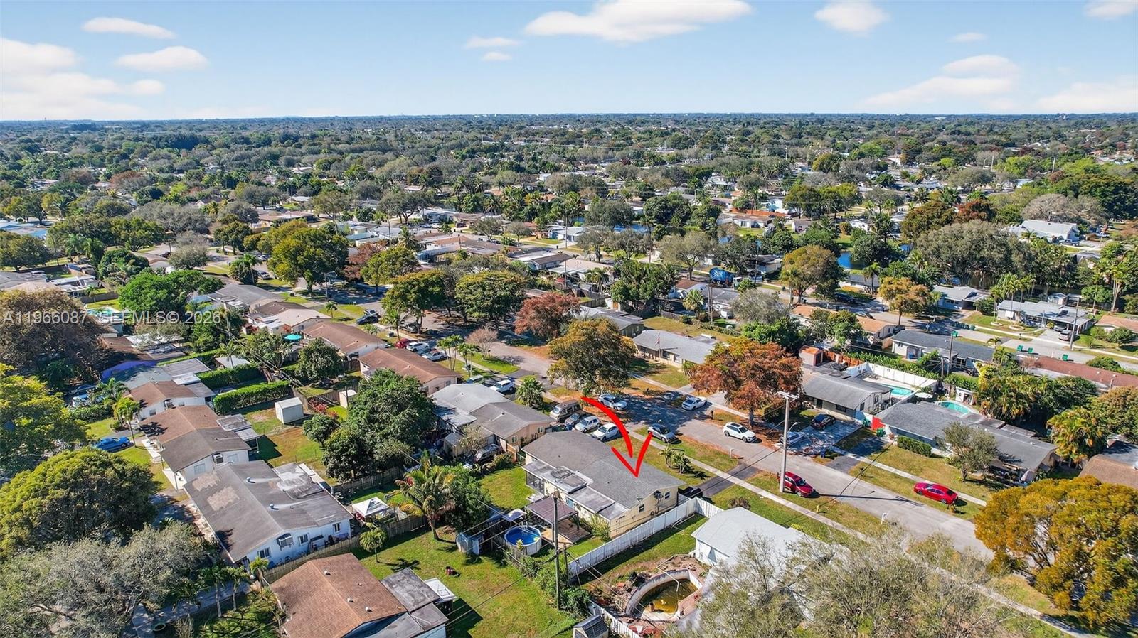 4998 Southwest 92nd Terrace Cooper City, FL 33328 - Photo 43 of 47 an aerial view of a city with lots of residential buildings