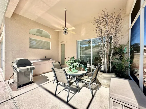 a view of a patio with furniture