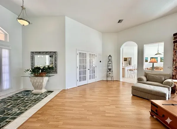 a living room with furniture and a rug