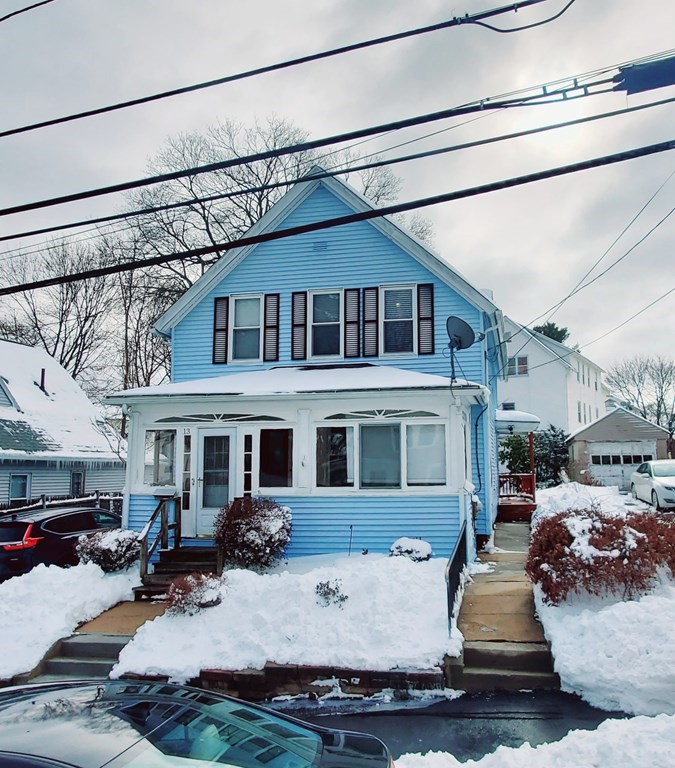 13 Whipple Street Worcester, MA 01607 - Photo 3 of 17 a front view of a house with a porch