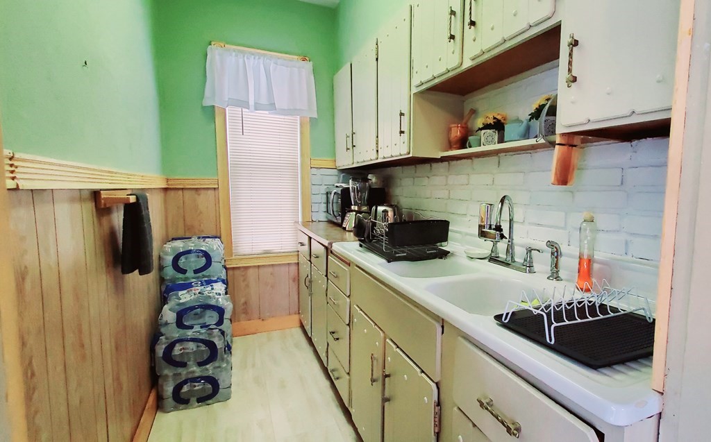 13 Whipple Street Worcester, MA 01607 - Photo 10 of 17 a kitchen with a sink and cabinets