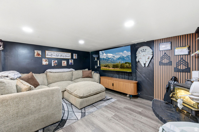 2323 North 720 West Clinton, UT 84015 - Photo 13 of 34 Living area featuring light wood-type flooring and recessed lighting