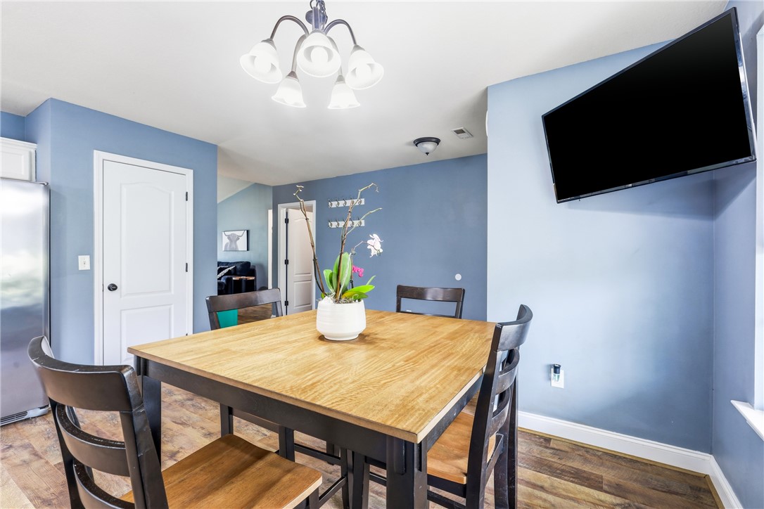 105 Lacy Lane Anderson, SC 29621 - Photo 6 of 16 A casual dining space features a warm wood table, inviting for daily meals.