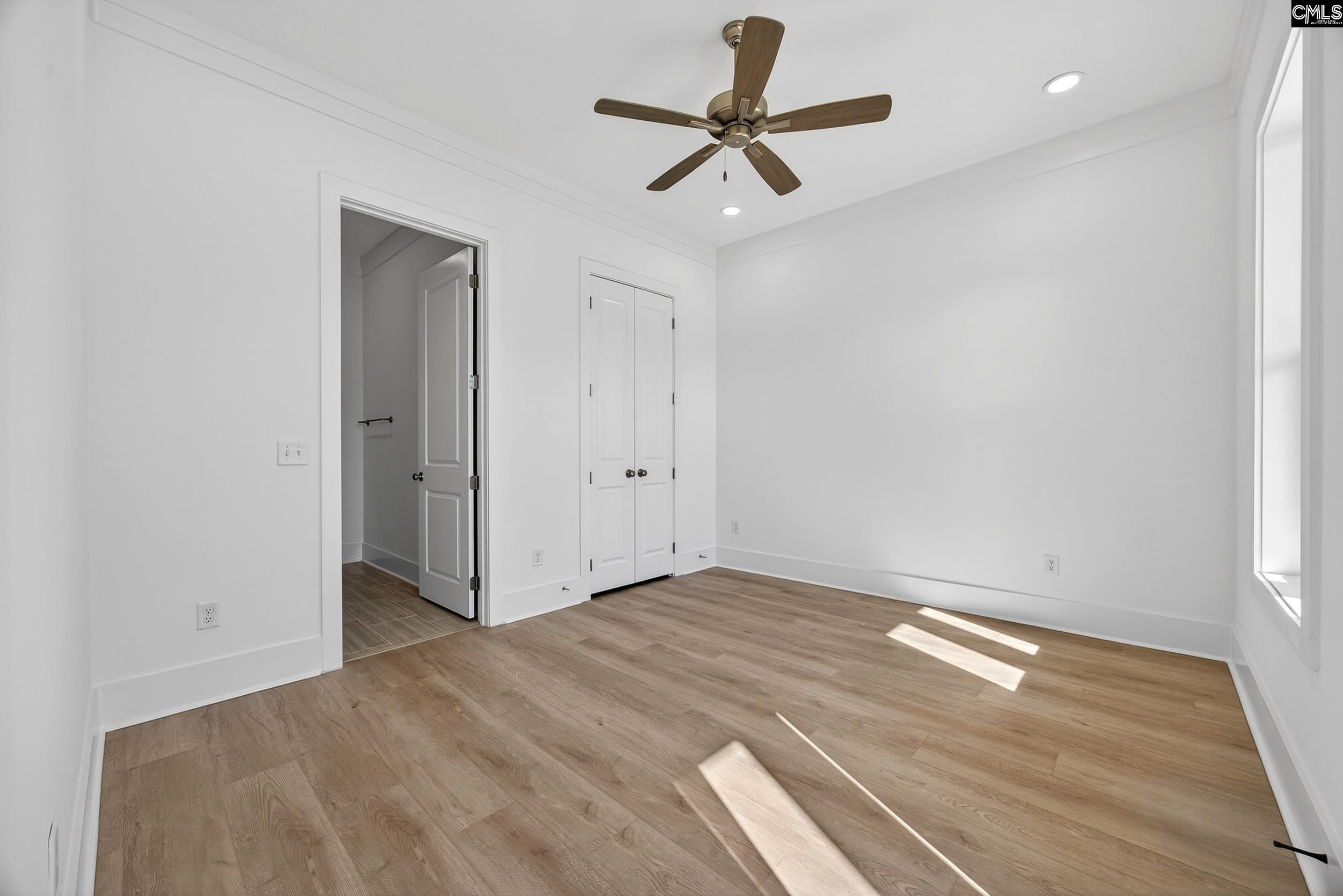 1318 Long Grove Way Lexington, SC 29072 - Photo 58 of 90 a view of empty room with wooden floor