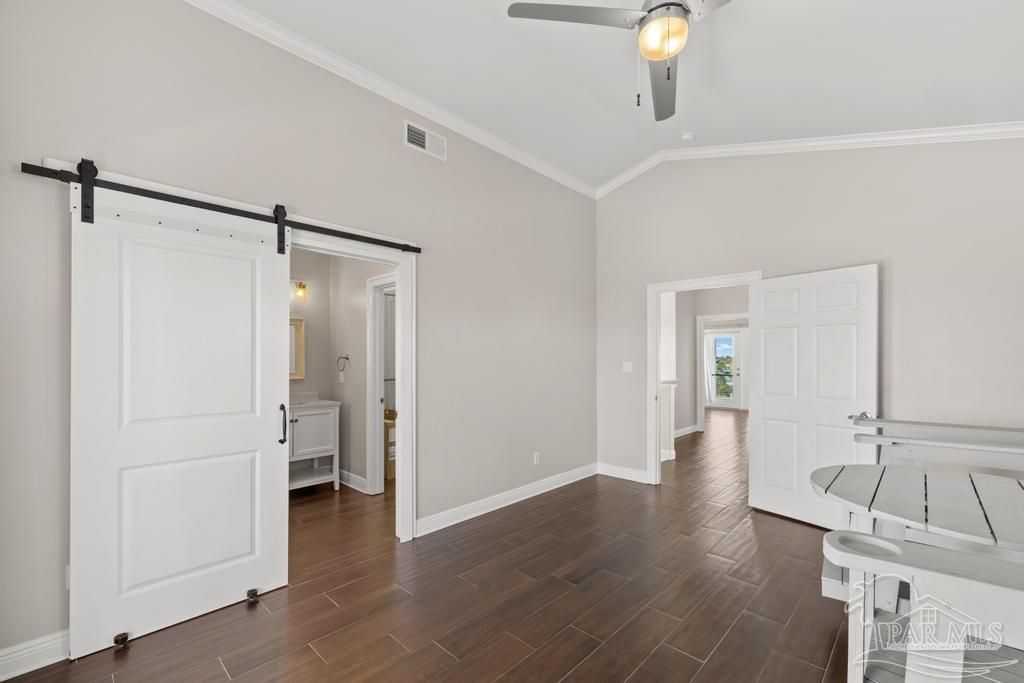 321 Gulfview Lane Perdido Key, FL 32507 - Photo 33 of 57 a view of a room with wooden floor
