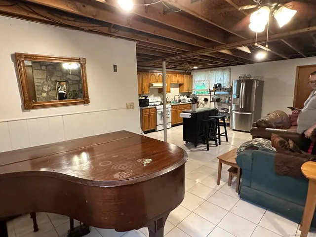 a view of a living room and dining room