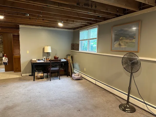 a room with furniture and a window