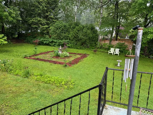 a view of swimming pool from a balcony
