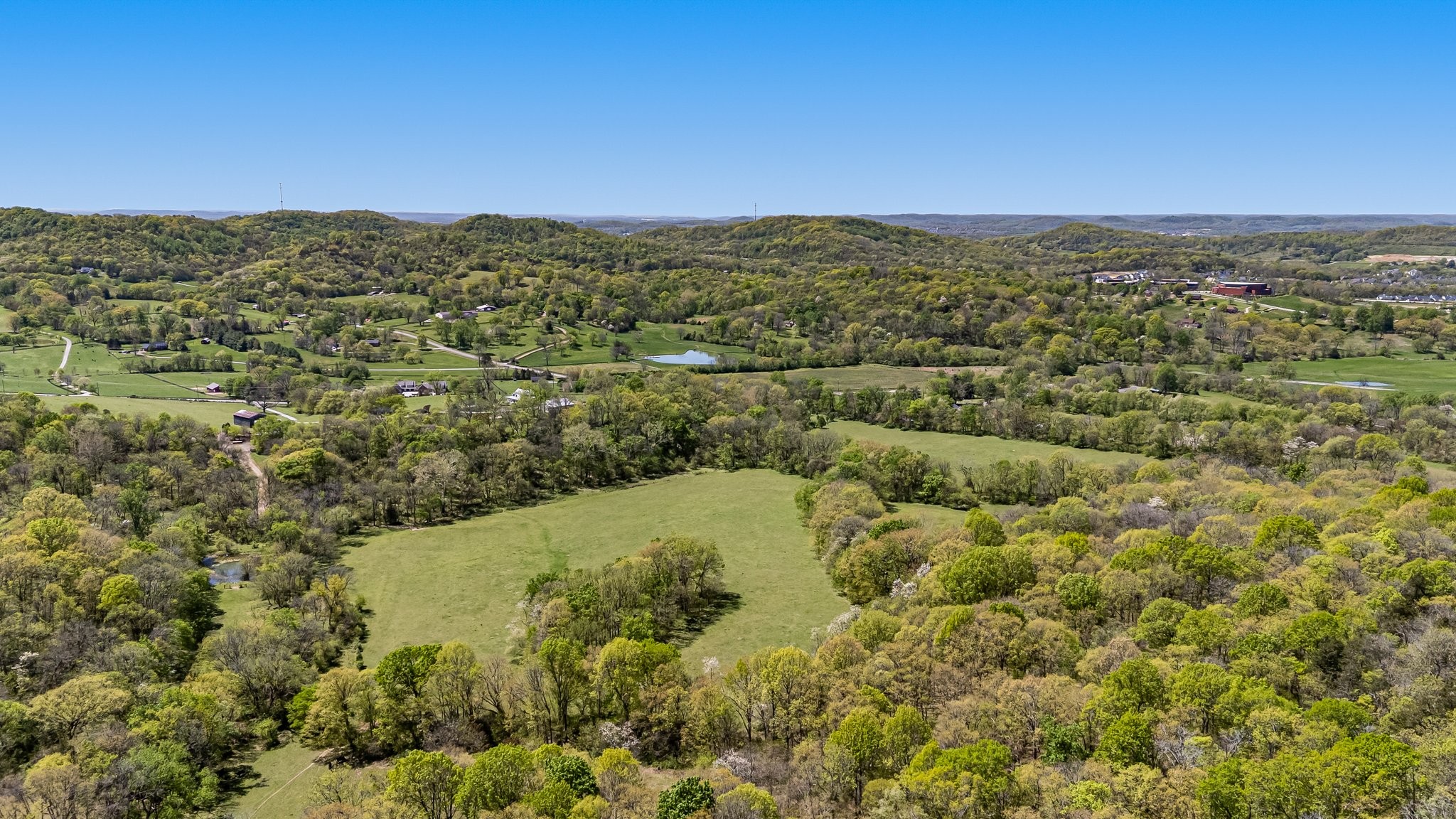 4540 Peytonsville Road Franklin, TN 37064 - Photo 14 of 84 an aerial view of residential houses with outdoor space and trees