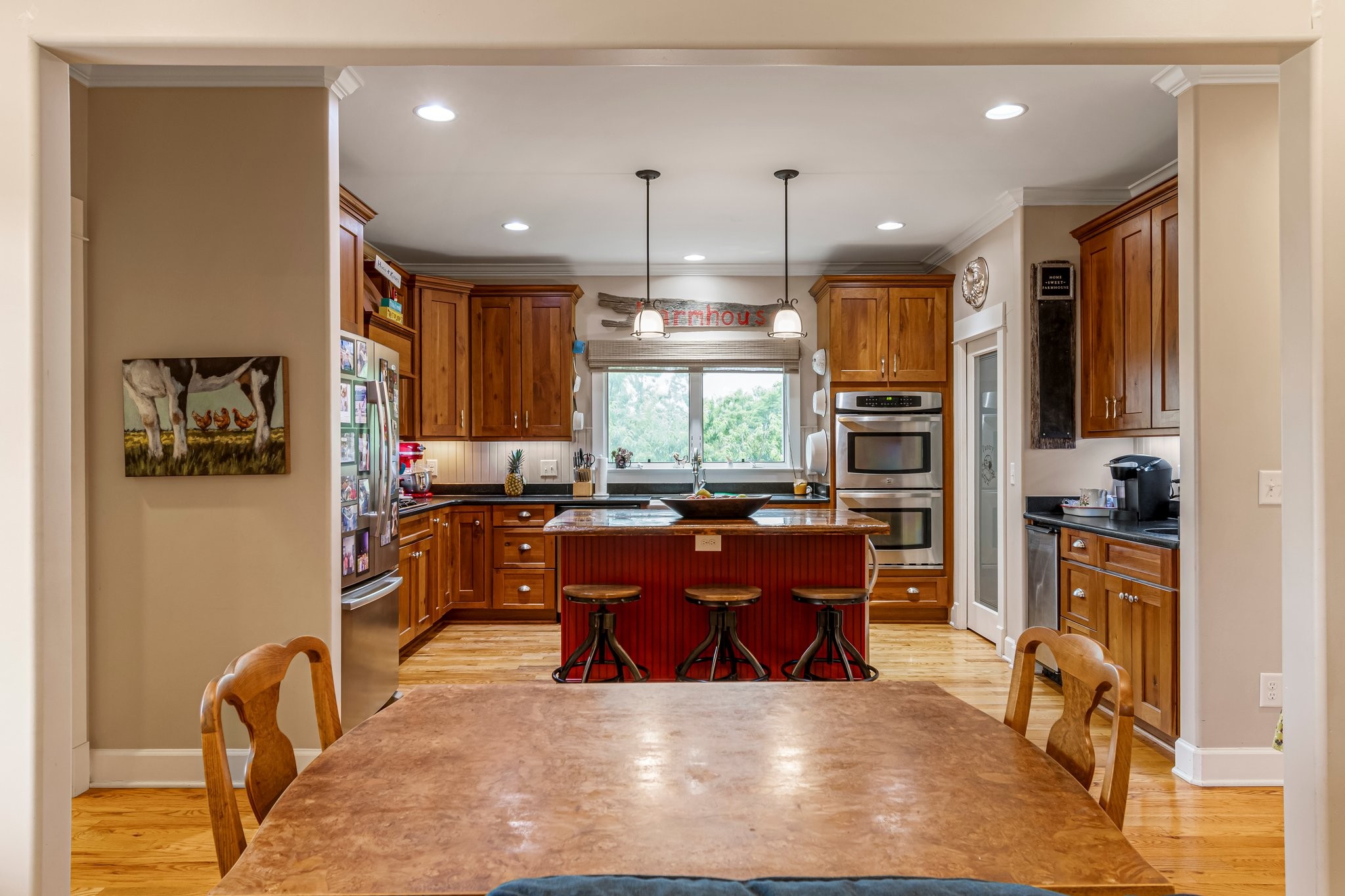 4540 Peytonsville Road Franklin, TN 37064 - Photo 50 of 84 a view of a dining room with furniture window and wooden floor