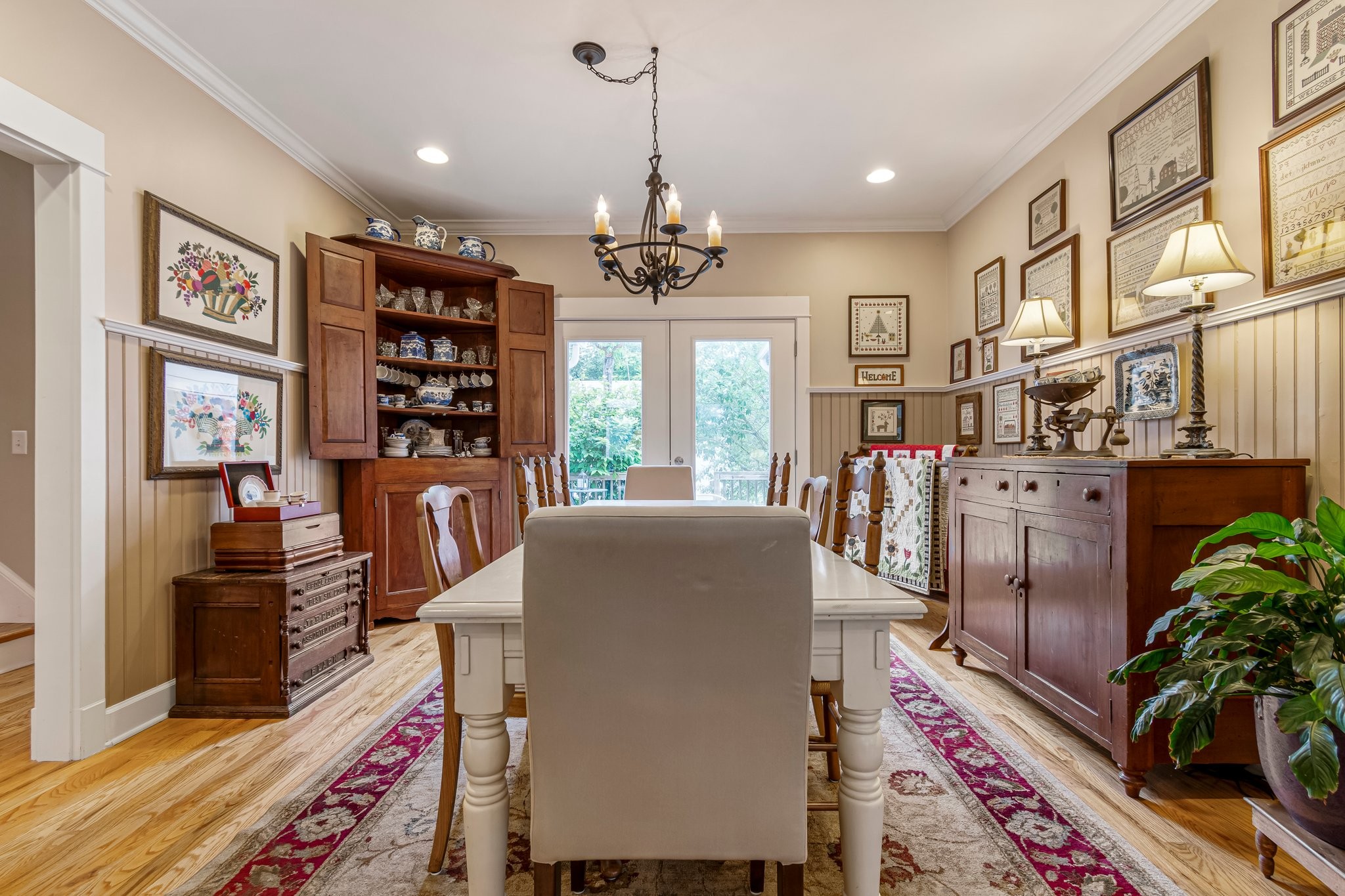 4540 Peytonsville Road Franklin, TN 37064 - Photo 56 of 84 a living room with furniture a bookshelf and a chandelier