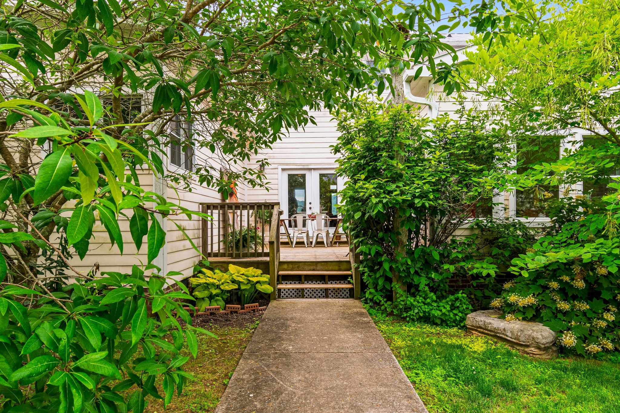 4540 Peytonsville Road Franklin, TN 37064 - Photo 60 of 84 a front view of a house with a garden