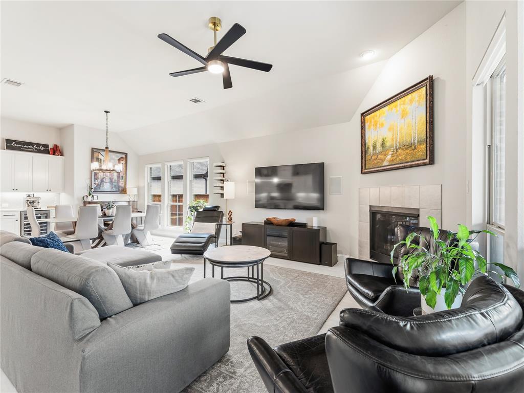 15340 Crape Myrtle Road Frisco, TX 75035 - Photo 16 of 40 Open-concept living space with vaulted ceilings